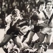 Neil Holding tackles New Zealand's Fred Ah Kuoi