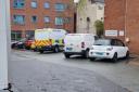 A police van and car outside the Millennium Centre on Thursday