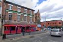 Arrest made after man found with head injury outside Birkenhead pub