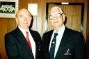PICTURED:BILL Lyon (left) congratulates Saints’ chairman Harry Cook on his retirement in 1994