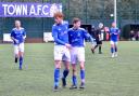 Liam Diggle and Pacey Garret celebrate a Town goal