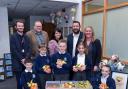 Cabinet members, school staff and council officers with children from St Mary's Catholic Primary, Blackbrook.