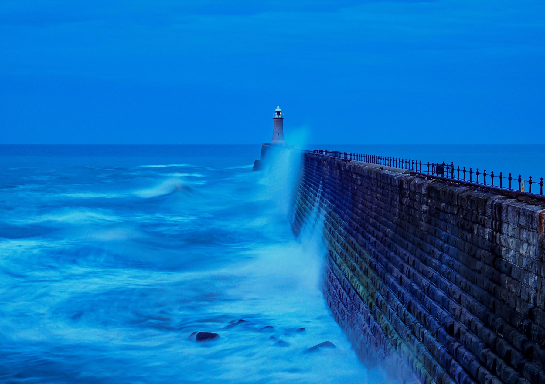 Long exposure of the North Sea battering the sea wall at Tynemouth Lighthouse