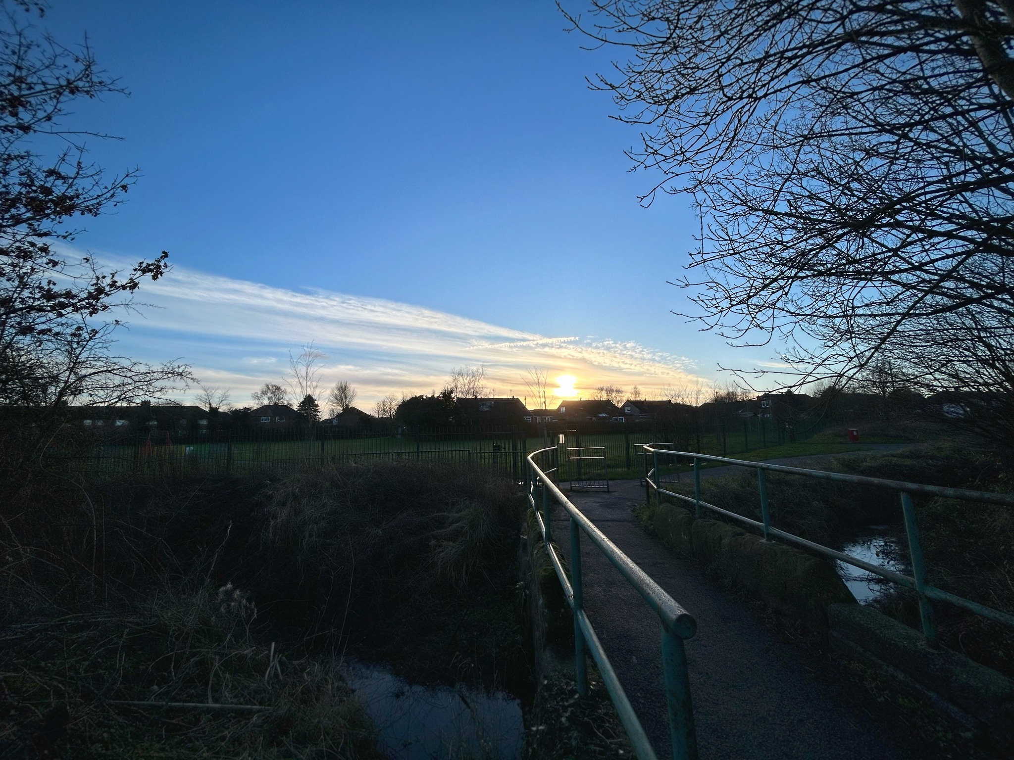 Sunset over the stream near Two Butt Lane by Kevin Moulsdale