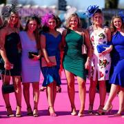 Racegoers turned on the style at Ladies Day - Picture: PA