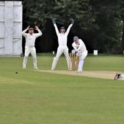 John Dotters (kneeling) finished the season with 102 wickets for Rainford