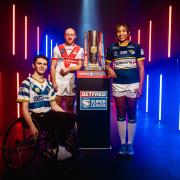 Rob Hawkins of Halifax Panthers, James Roby of St Helens and Sophie Robinson of Leeds Rhinos - representatives of the 2022 Betfred Super League champions