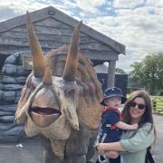 Kelsey and her son with on of the Dinosaurs at Knowsley Safari Park