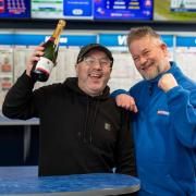 Steven Orford has won £29,000 on a  bet with Betfred. Pictured with Betfred store manager Tibor Thot