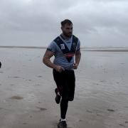 Alex Walmsley and Tee Ritson training on Formby beach