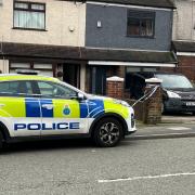 Police at the scene of the 'gunshot' incident in Parr
