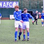 Liam Diggle and Pacey Garret celebrate a Town goal