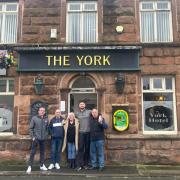 Pub staff and regulars at the York Hotel