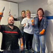 Carly and the Newton Spar team painting the changing rooms