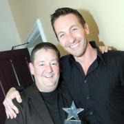 Well done mate: Roger Graney presents the Imperial Arts award to a chuffed Johnny Vegas