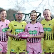 Super League referees wearing the new Specsaver-branded kit