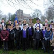 The Mayor with VIPs and the pupils who planted the poppy seeds.