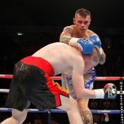 Martin Murray sees off Cedric Spera. Pictures: Lawrence Lustig