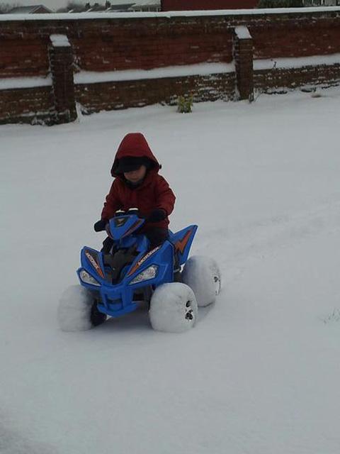 Emma Hunter tweeted in this picture of her son, three-year-old Mason, enjoying the snow.