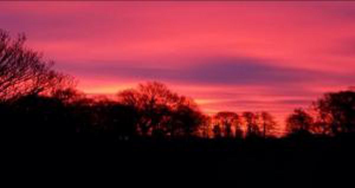 Sue Brown sent in this beautiful picture of the red morning sky over St Helens in February 2015