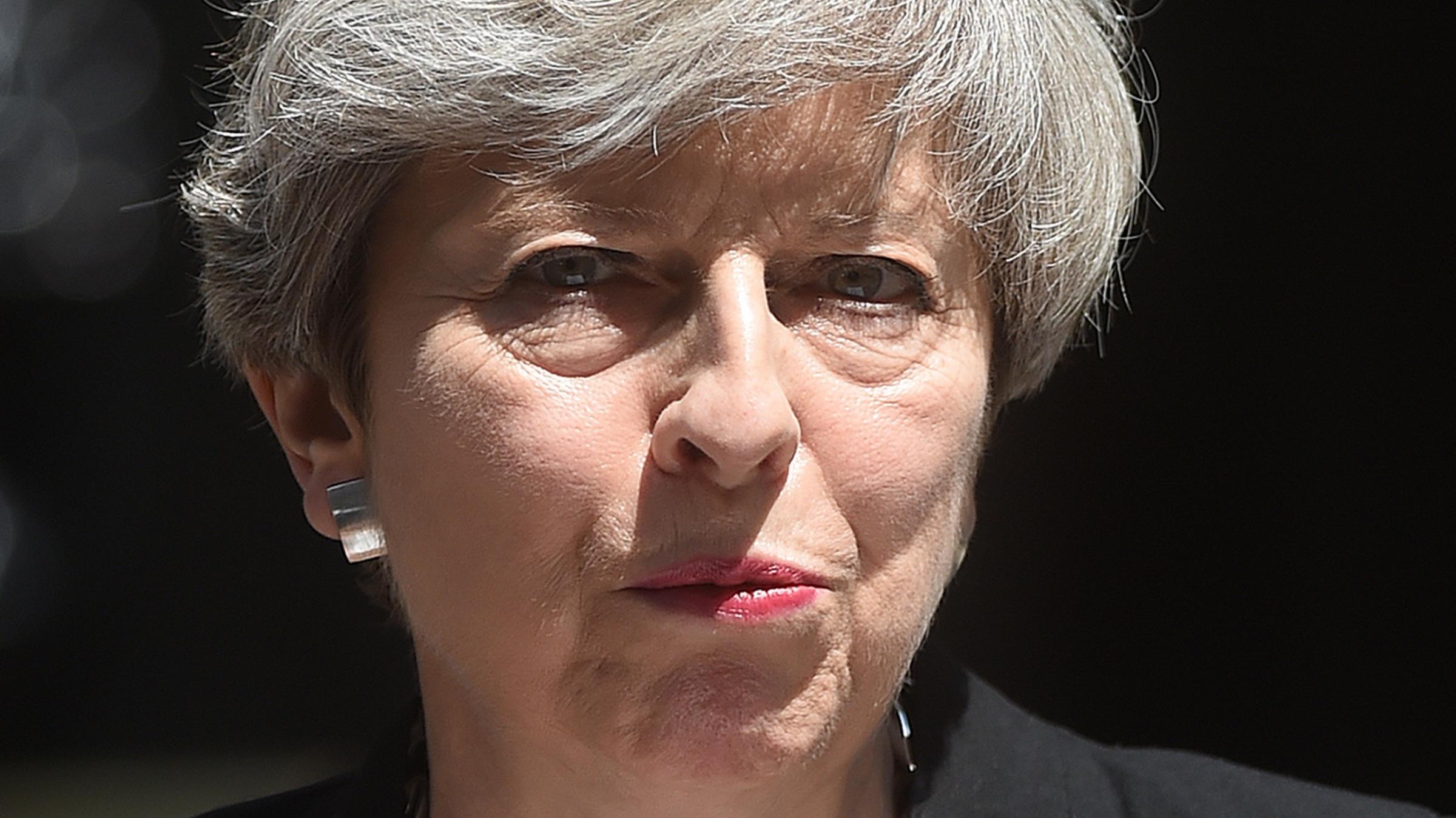 Theresa May 'getting on with job' despite fierce criticism - St Helens Star