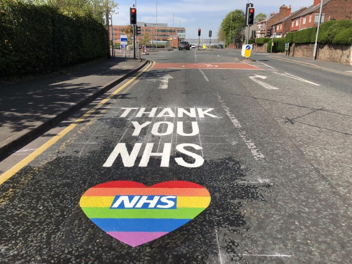 Signs supporting the NHS on the route to Whiston Hospital