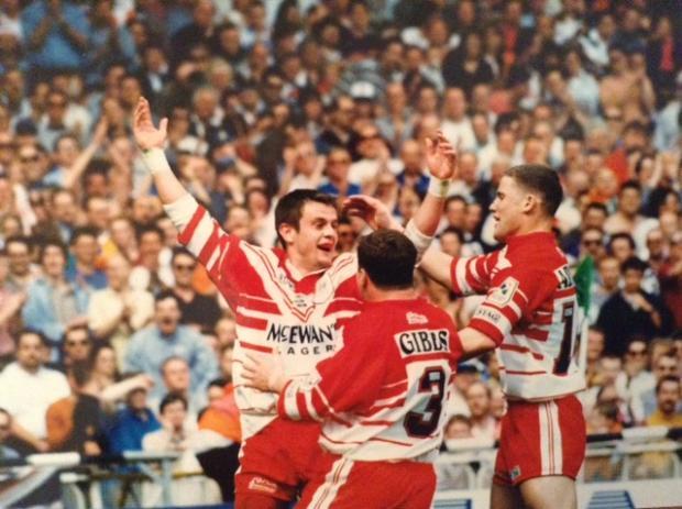 Steve Prescott celebrates after scoring one of his two tries