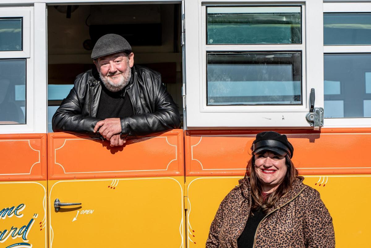 Johnny Vegas and Bev Dixon - with the Maltese bus that was restored in Carry on Glamping