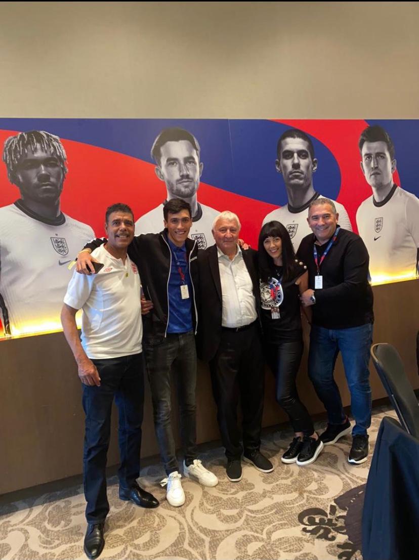 Harrison, Gail and Andy Coady with ex-footballers Chris Kamara and Mike Summerbee at Wembley