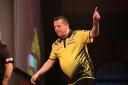 Dave Chisnall bounces back to reach Round 3 of World Darts Championship