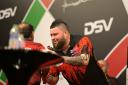 Michael Smith makes a confident start in Bahrain Darts Masters