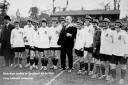 5 ft 8in Lizzy, two to the left of comedian George Robey, who Lily Parr is embracing, in 1925 at the Herne Hill Velodrome for England v 'France as Dick Kerr beat Femina Sport of Paris 4-2