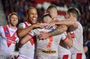 Saints celebrate a try last year