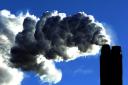 Smoke from a power station chimney - stock image