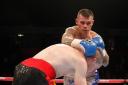 Martin Murray sees off Cedric Spera. Pictures: Lawrence Lustig