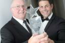 Bill is congratulated on his award by Garry Fortune, general manager at Haydock Park