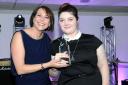 Overcoming the odds: Elizabeth collects her award from Julia Callaghan