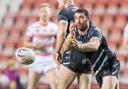 Matty Smith playing for Widnes Vikings during 2022