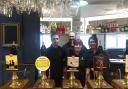 Licensee Anthony Murtagh (middle, back) and staff at the renovated Lamb