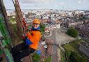 Janet Hart taking part in Cathedral abseil