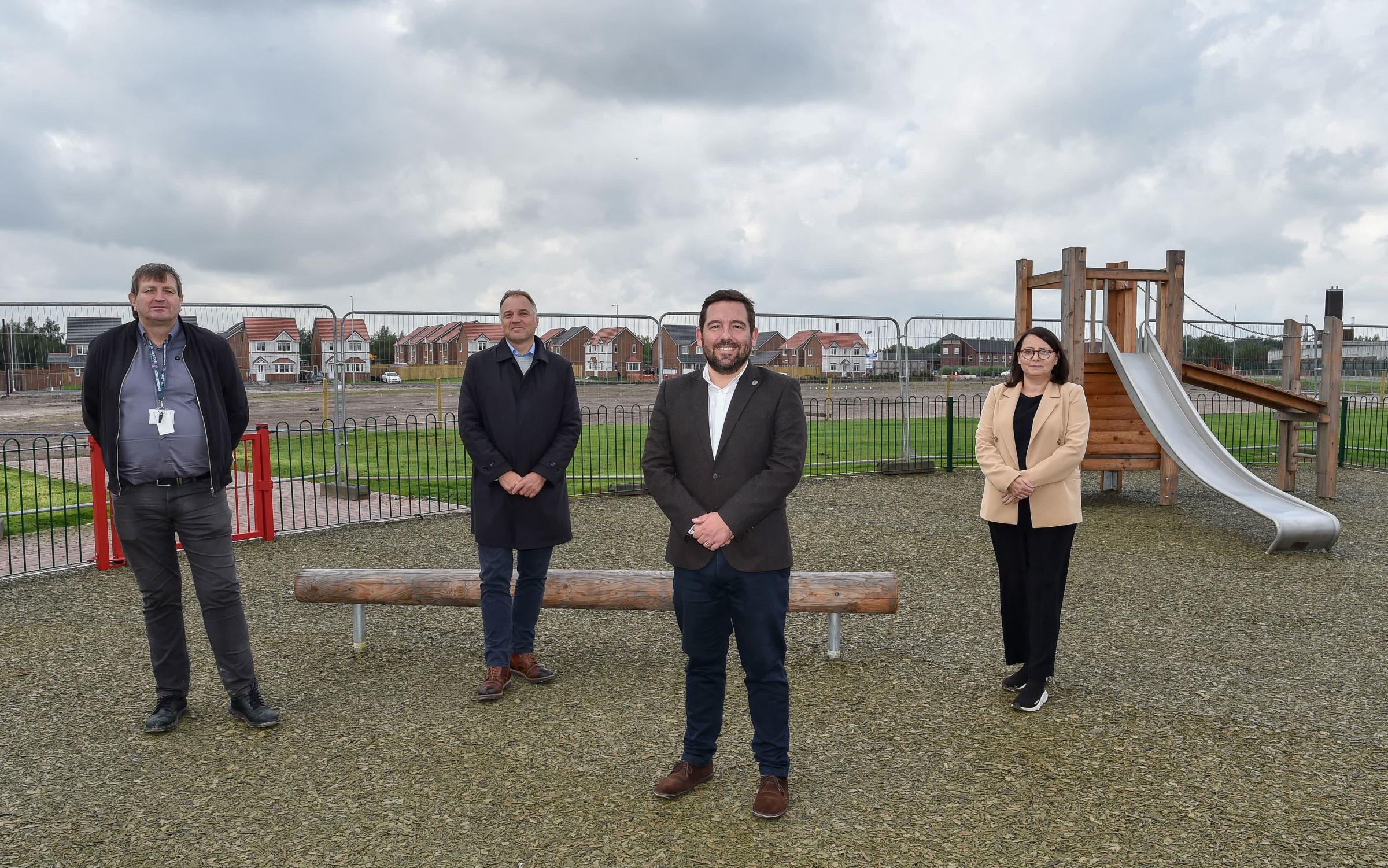 Cllr Richard McCauley; Steven Knowles, Cllr David Baines and Lisa Harris at the new family park on site ready for homes to be built at Moss Nook