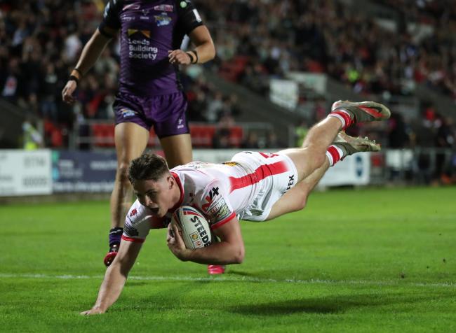 St Helens' Jack Welsby scores their side's second try of the game during the Betfred Super League match at the Totally Wicked Stadium