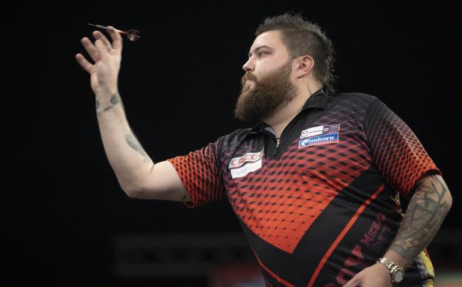 Michael Smith in action during his win over Michael van Gerwen. Pic: PDC