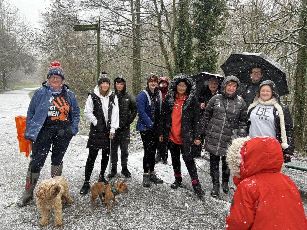 St Helens Star: Campaigners in the snow protesting violence against women and girls in Blackbrook