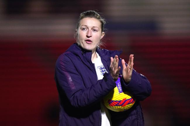 England’s Ellen White with the match ball after the 20-0 victory against Latvia