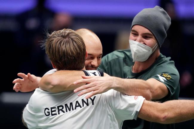 Germany’s Kevin Krawietz, Tim Puetz and Jan-Lennard Struff celebrate beating Great Britain