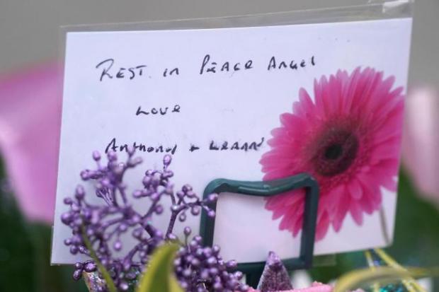 St Helens Star: Tributes have been left in memory of Ava in Liverpool City Centre (Pic: PA)