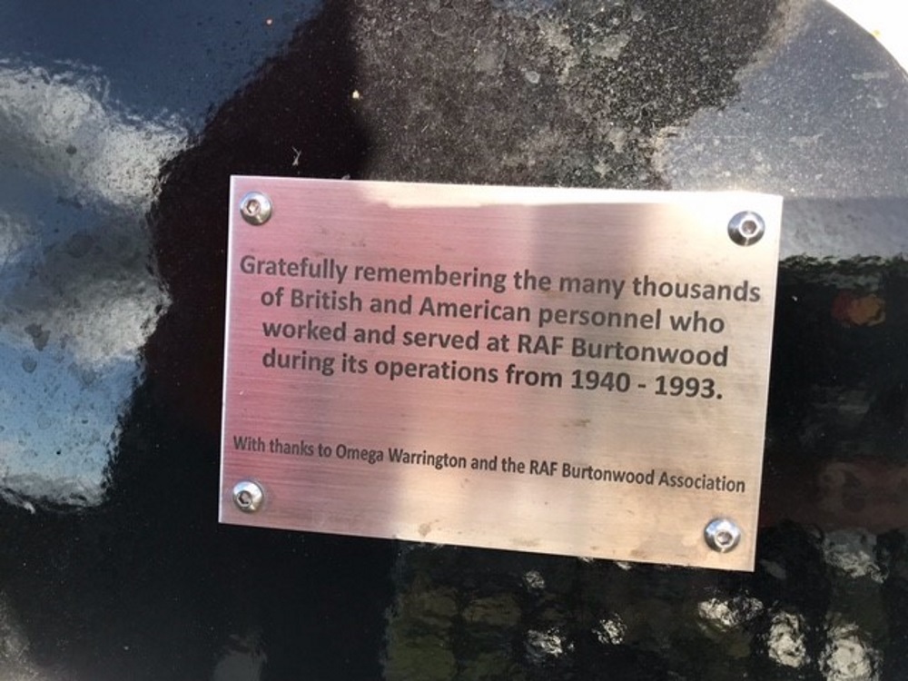 A plaque on one of the benches commemorating those who served at the base
