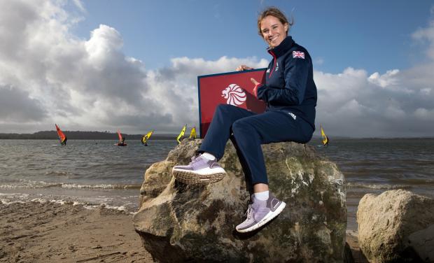 St Helens Star: Sailing gold-medallist Hannah Mills awarded an OBE. Picture: PA