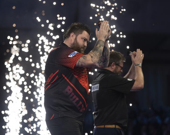 Michael Smith beat James Wade to reach the final. Pic: Lawrence Lustig/PDC